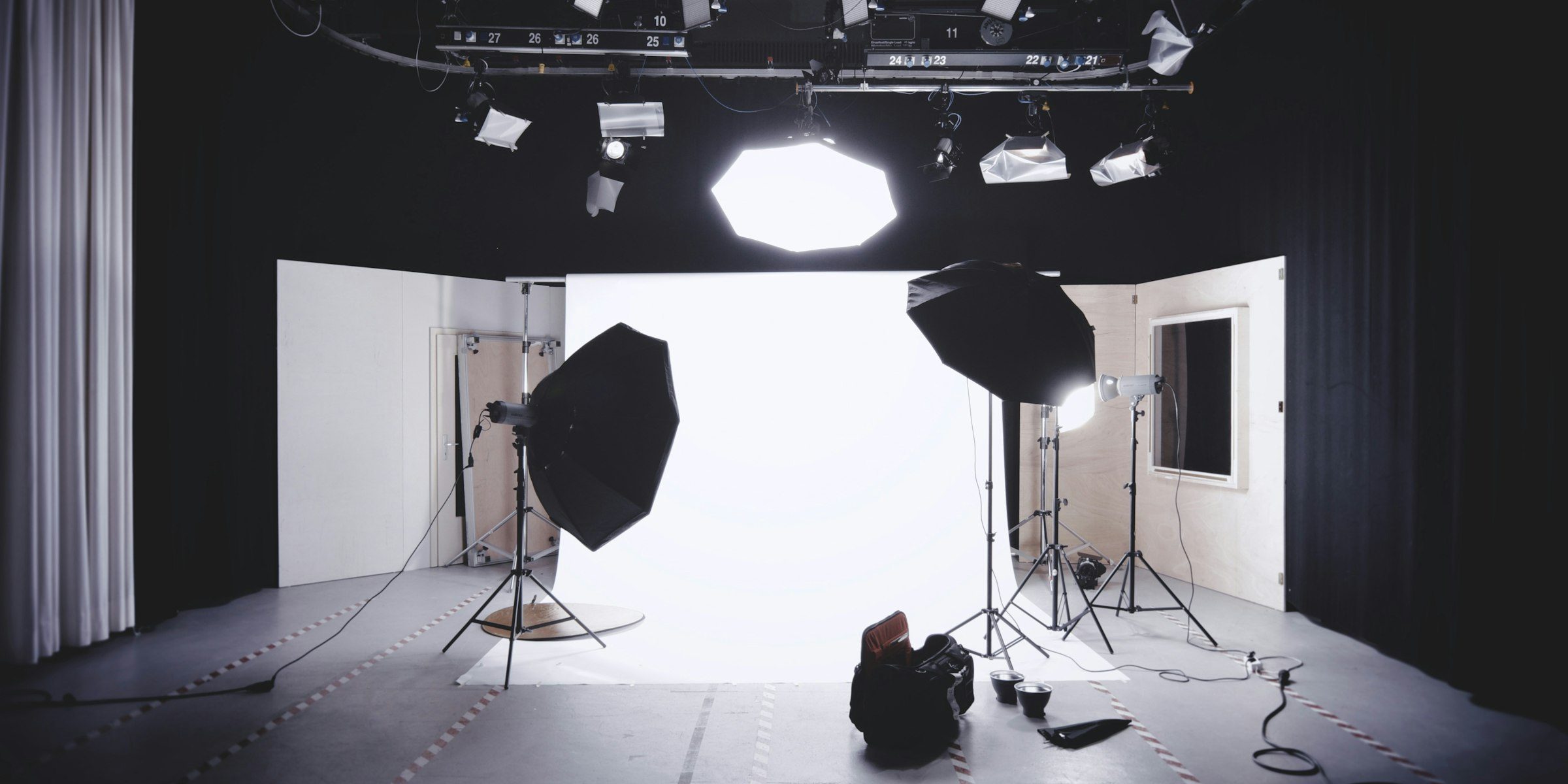 A product photography studio lit for a plain white background
